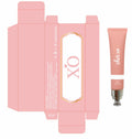 Pink cosmetic packaging layout showing a tube and matching box with the brand name 'she's xo' and product shade 'VC47'.