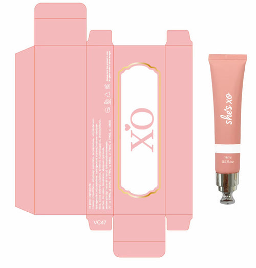 Pink cosmetic packaging layout showing a tube and matching box with the brand name 'she's xo' and product shade 'VC47'.